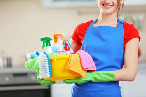 Carpet cleaning team preparing equipment safely