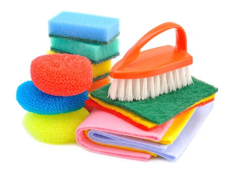 Technician applying professional carpet cleaning treatment